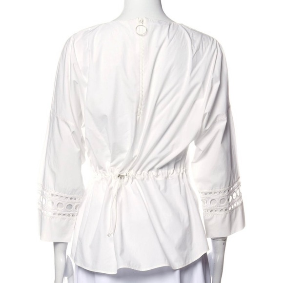 Akris Punto Blouse
Three-Quarter Sleeve/Bateau Neckline
Exposed Zip Closure back - Picture 3 of 3